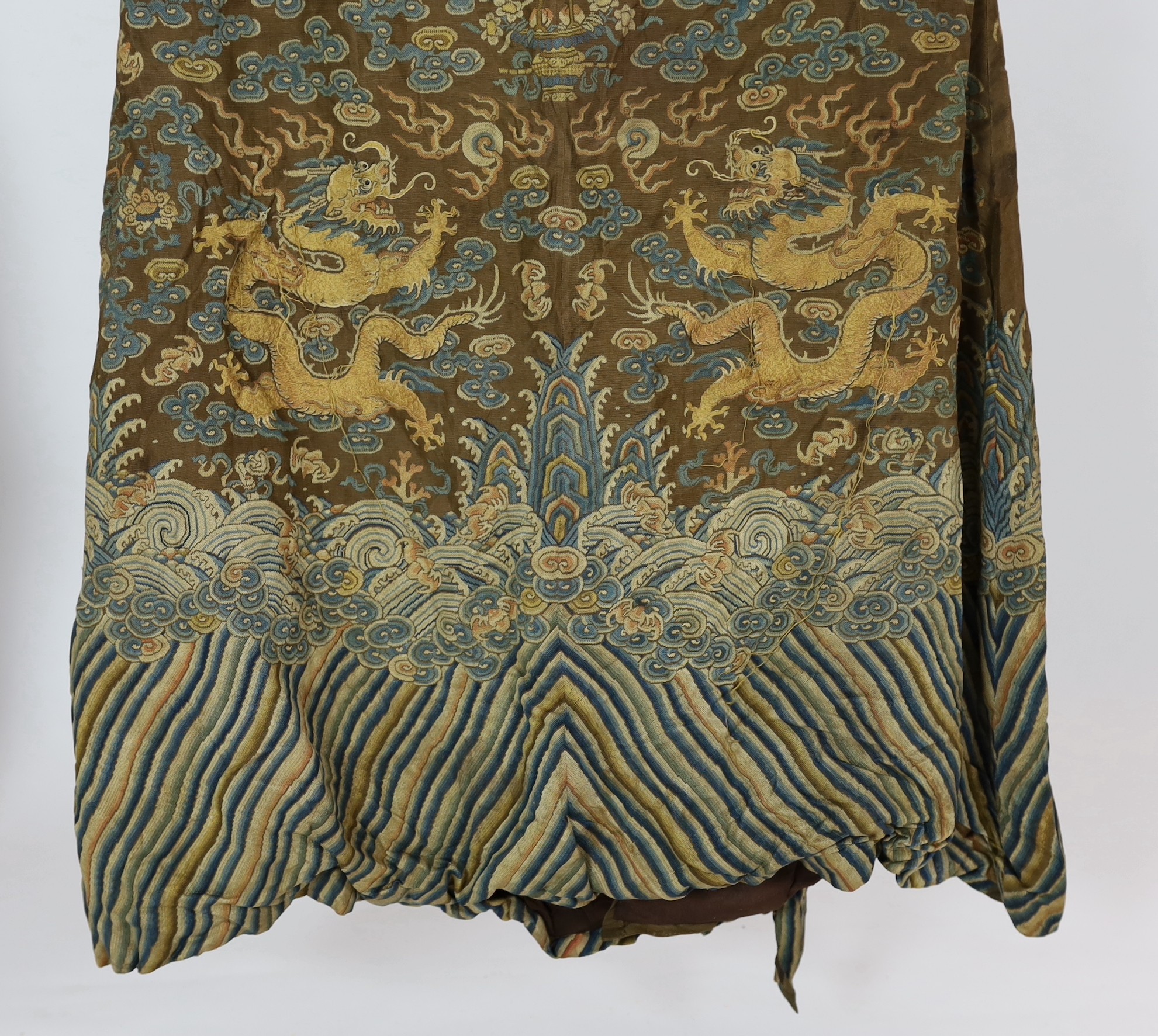A Chinese embroidered silk and kesi gauze ’dragon’ summer robe, late Qing dynasty, some alterations and unpicked threads